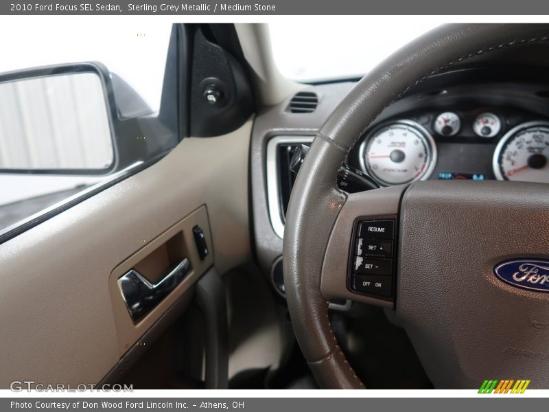Sterling Grey Metallic / Medium Stone 2010 Ford Focus SEL Sedan