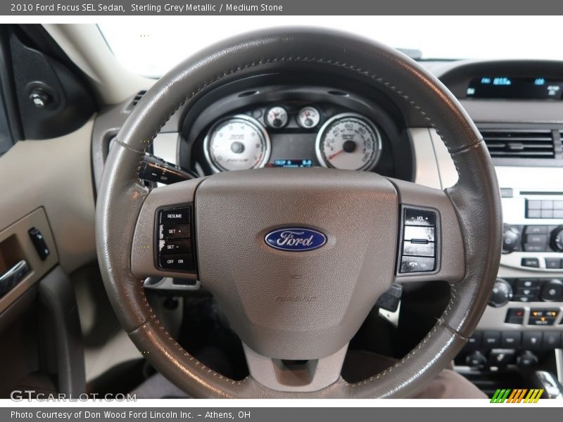 Sterling Grey Metallic / Medium Stone 2010 Ford Focus SEL Sedan