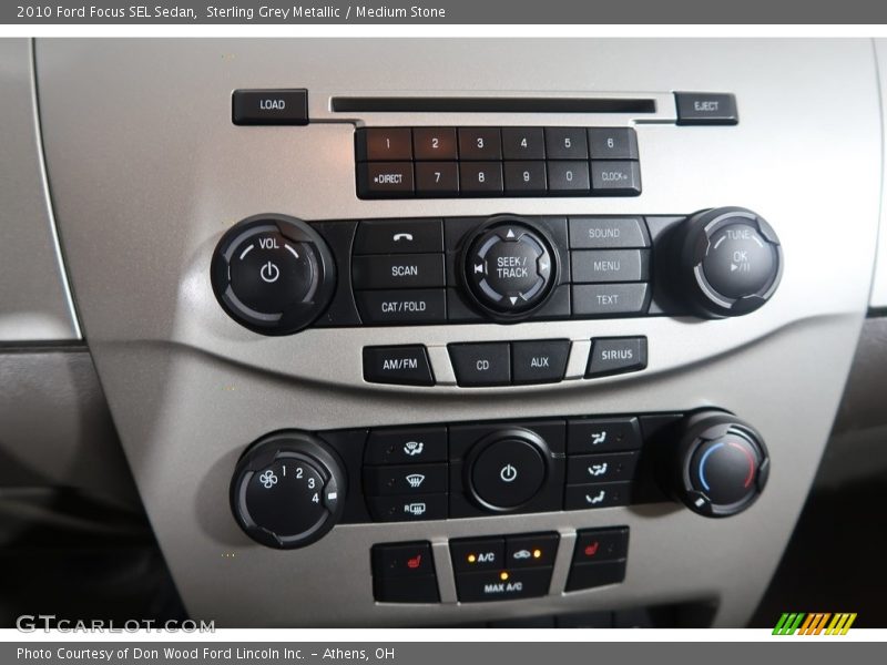 Sterling Grey Metallic / Medium Stone 2010 Ford Focus SEL Sedan