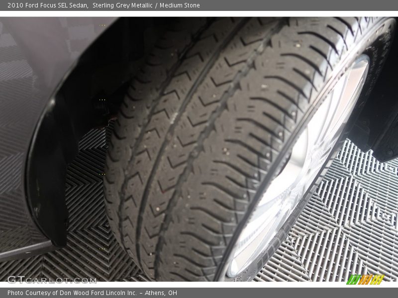 Sterling Grey Metallic / Medium Stone 2010 Ford Focus SEL Sedan