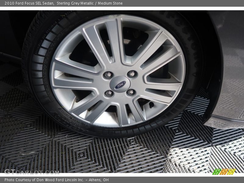 Sterling Grey Metallic / Medium Stone 2010 Ford Focus SEL Sedan