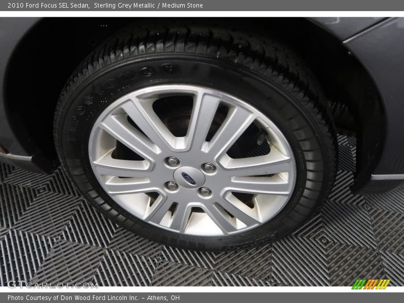 Sterling Grey Metallic / Medium Stone 2010 Ford Focus SEL Sedan