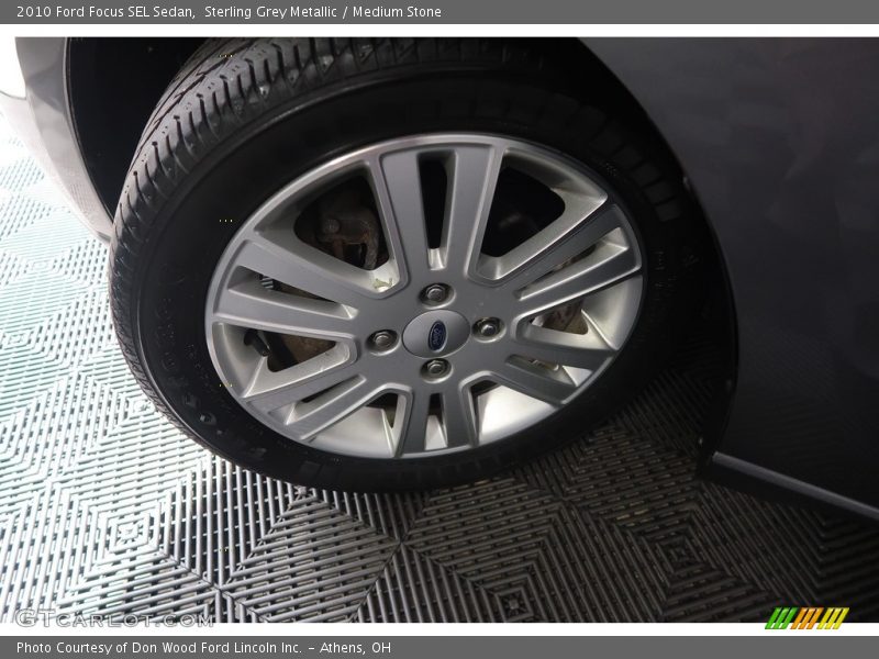 Sterling Grey Metallic / Medium Stone 2010 Ford Focus SEL Sedan