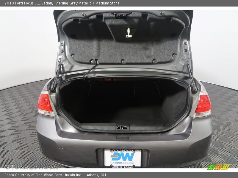 Sterling Grey Metallic / Medium Stone 2010 Ford Focus SEL Sedan