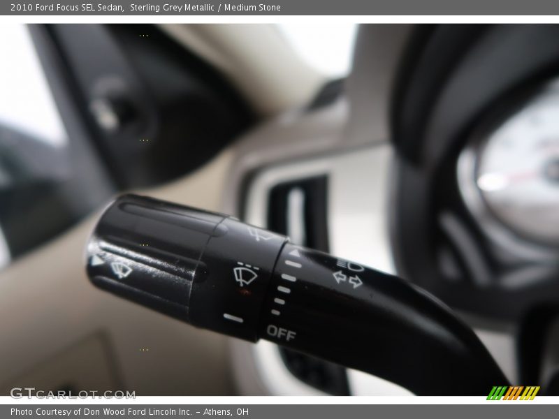 Sterling Grey Metallic / Medium Stone 2010 Ford Focus SEL Sedan