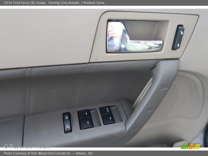 Sterling Grey Metallic / Medium Stone 2010 Ford Focus SEL Sedan