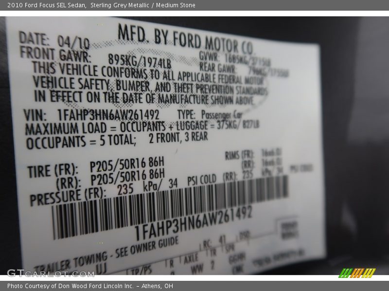 Sterling Grey Metallic / Medium Stone 2010 Ford Focus SEL Sedan