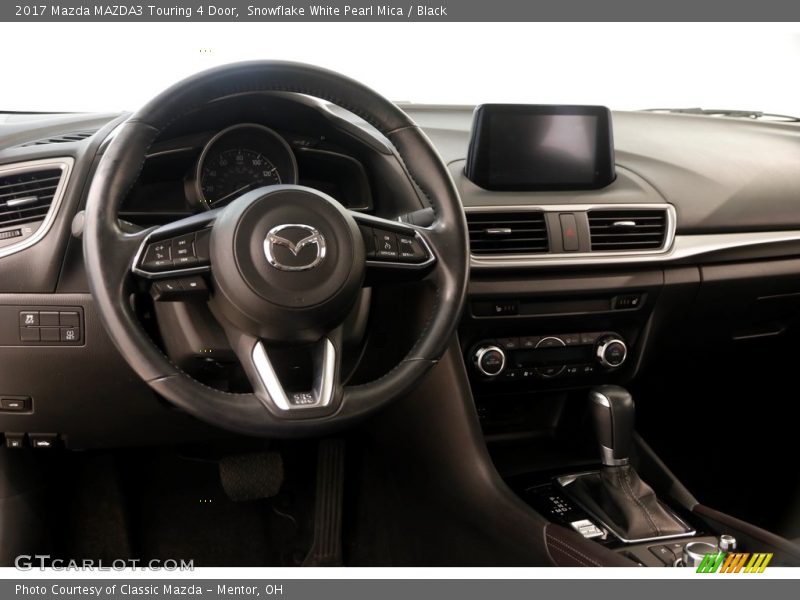Snowflake White Pearl Mica / Black 2017 Mazda MAZDA3 Touring 4 Door