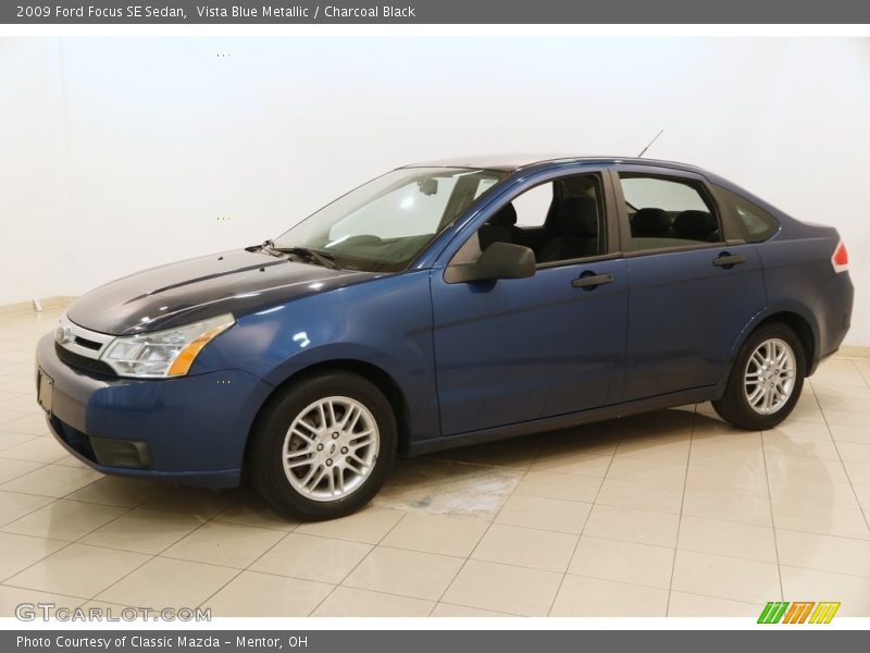 Vista Blue Metallic / Charcoal Black 2009 Ford Focus SE Sedan