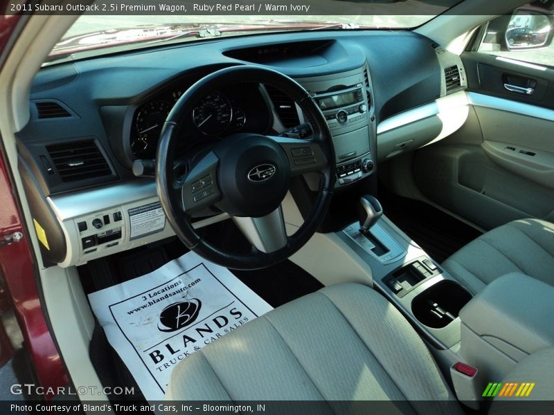 Ruby Red Pearl / Warm Ivory 2011 Subaru Outback 2.5i Premium Wagon