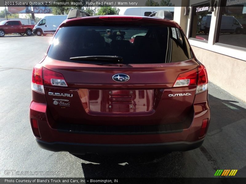 Ruby Red Pearl / Warm Ivory 2011 Subaru Outback 2.5i Premium Wagon