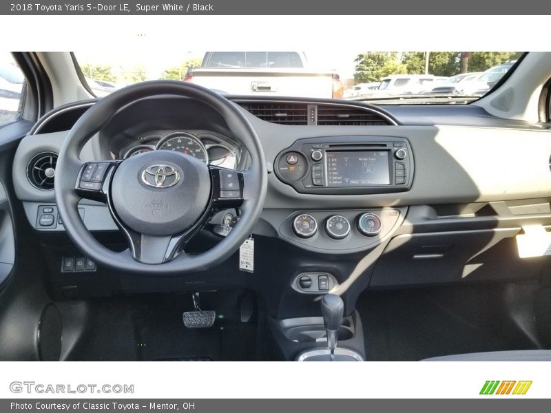 Super White / Black 2018 Toyota Yaris 5-Door LE