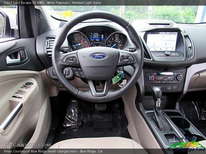 White Platinum / Medium Light Stone 2017 Ford Escape SE 4WD