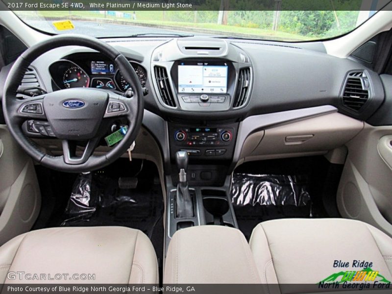White Platinum / Medium Light Stone 2017 Ford Escape SE 4WD