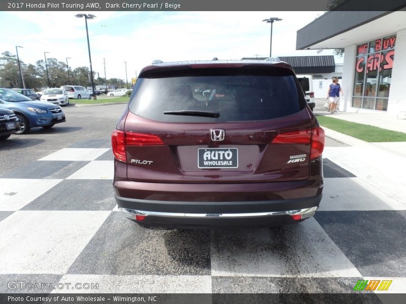 Dark Cherry Pearl / Beige 2017 Honda Pilot Touring AWD