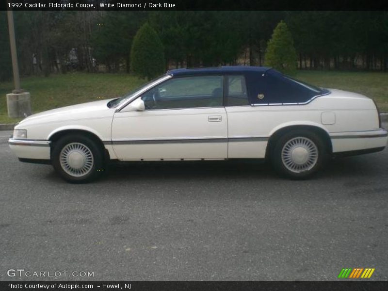 White Diamond / Dark Blue 1992 Cadillac Eldorado Coupe