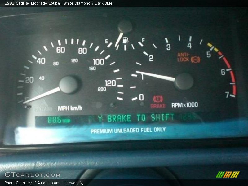 White Diamond / Dark Blue 1992 Cadillac Eldorado Coupe