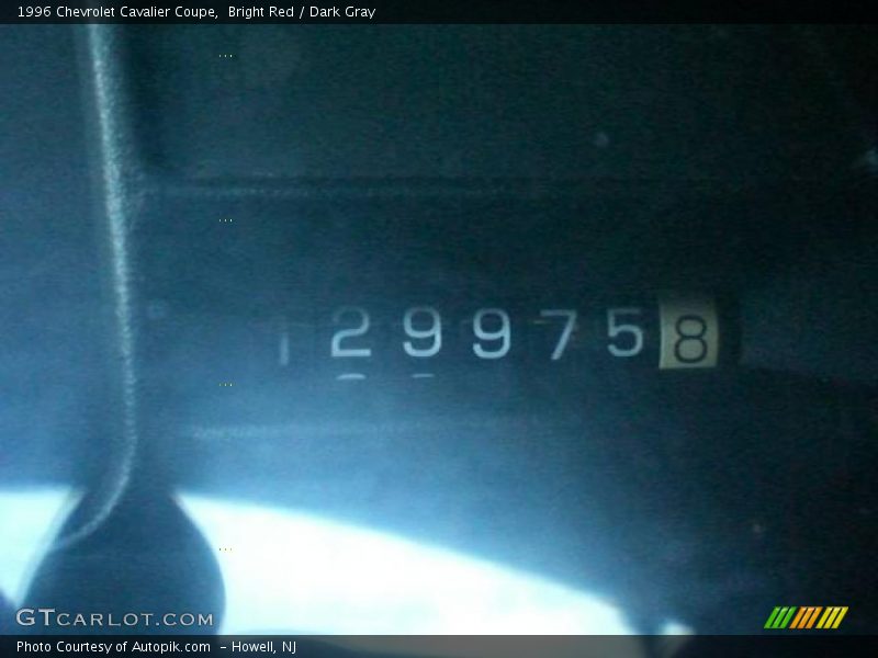Bright Red / Dark Gray 1996 Chevrolet Cavalier Coupe