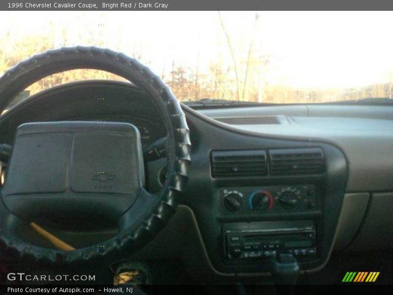 Bright Red / Dark Gray 1996 Chevrolet Cavalier Coupe