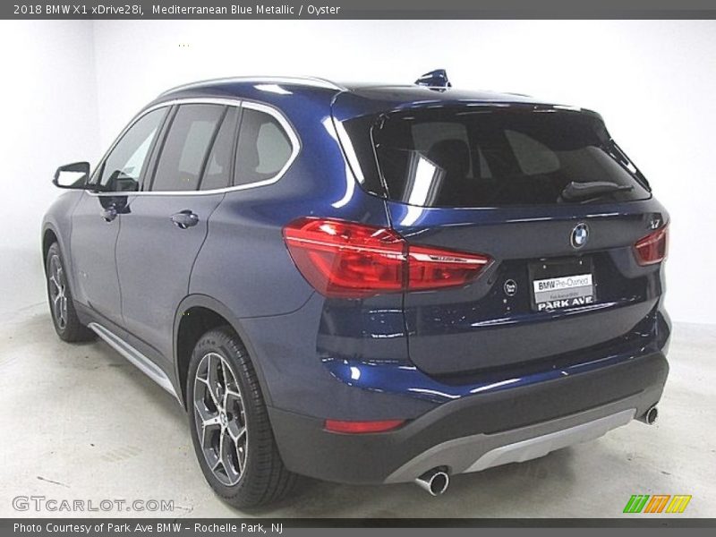 Mediterranean Blue Metallic / Oyster 2018 BMW X1 xDrive28i