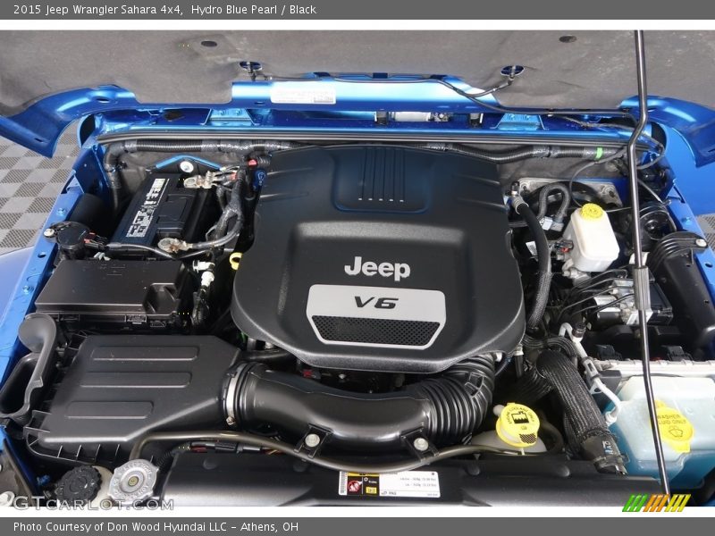 Hydro Blue Pearl / Black 2015 Jeep Wrangler Sahara 4x4