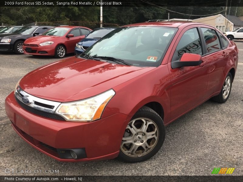 Sangria Red Metallic / Charcoal Black 2009 Ford Focus SES Sedan