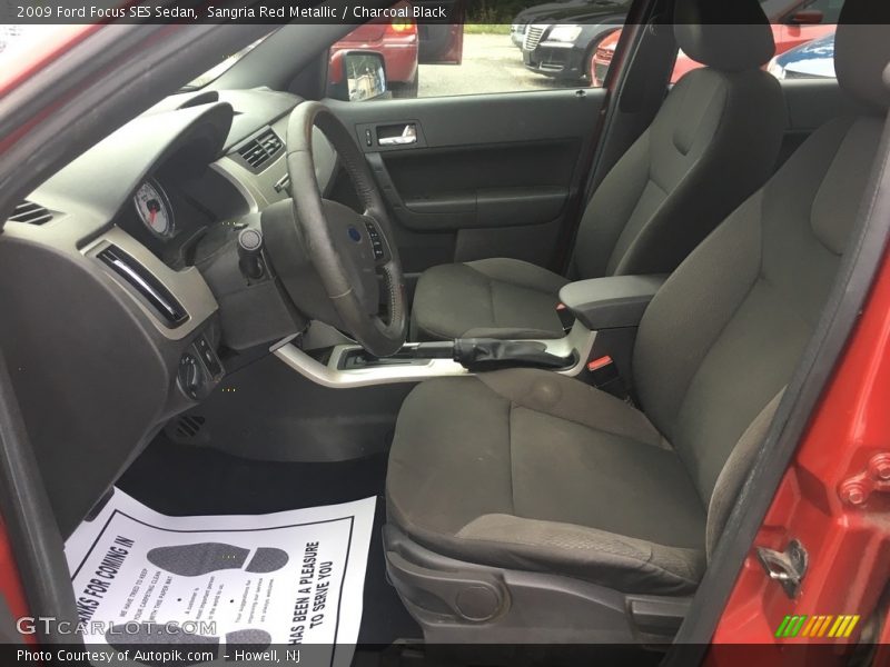 Sangria Red Metallic / Charcoal Black 2009 Ford Focus SES Sedan