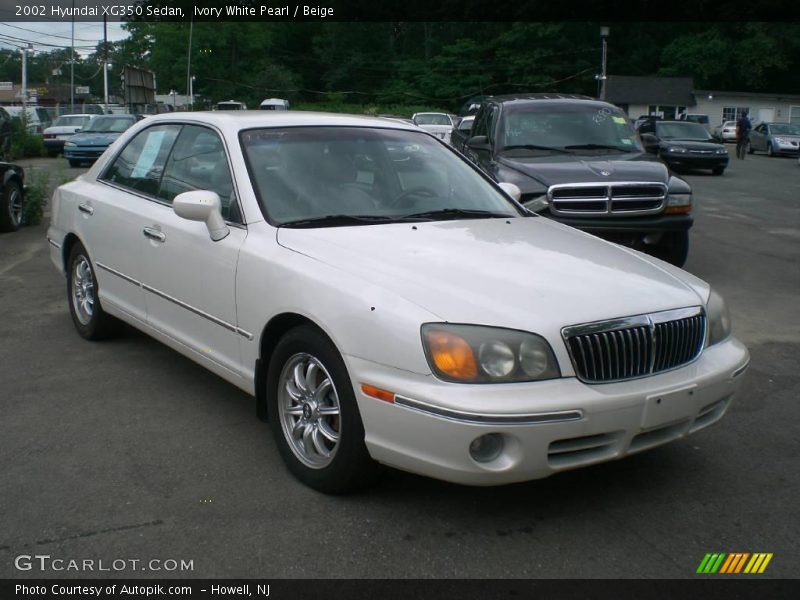 Ivory White Pearl / Beige 2002 Hyundai XG350 Sedan