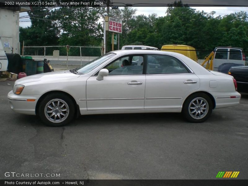 Ivory White Pearl / Beige 2002 Hyundai XG350 Sedan