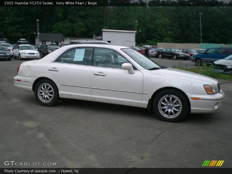 Ivory White Pearl / Beige 2002 Hyundai XG350 Sedan