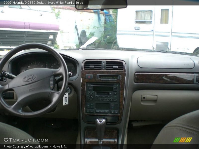 Ivory White Pearl / Beige 2002 Hyundai XG350 Sedan