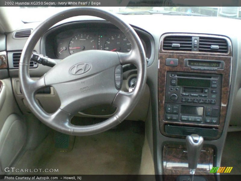 Ivory White Pearl / Beige 2002 Hyundai XG350 Sedan