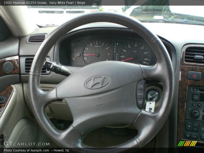 Ivory White Pearl / Beige 2002 Hyundai XG350 Sedan