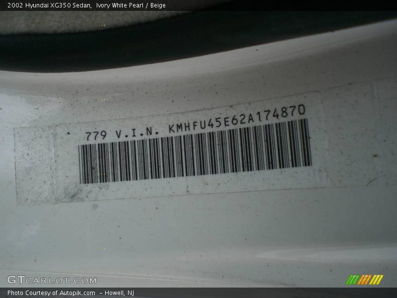 Ivory White Pearl / Beige 2002 Hyundai XG350 Sedan