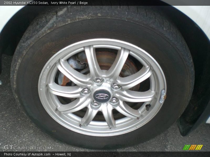 Ivory White Pearl / Beige 2002 Hyundai XG350 Sedan
