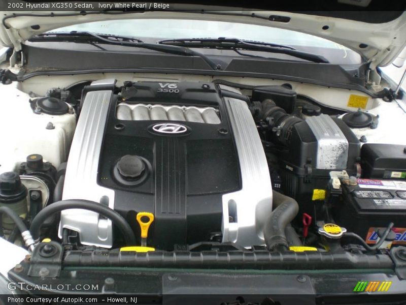 Ivory White Pearl / Beige 2002 Hyundai XG350 Sedan
