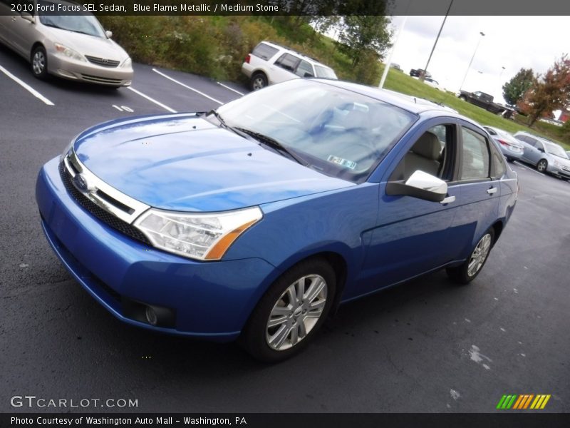 Blue Flame Metallic / Medium Stone 2010 Ford Focus SEL Sedan