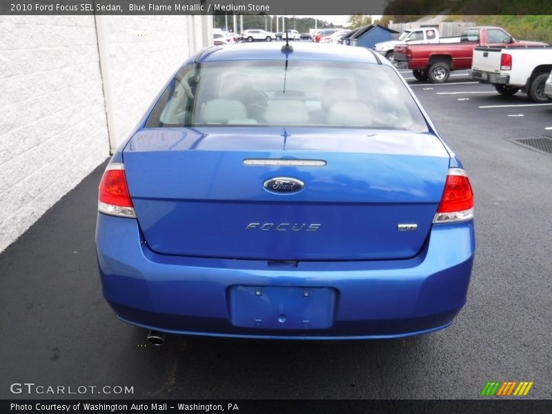 Blue Flame Metallic / Medium Stone 2010 Ford Focus SEL Sedan
