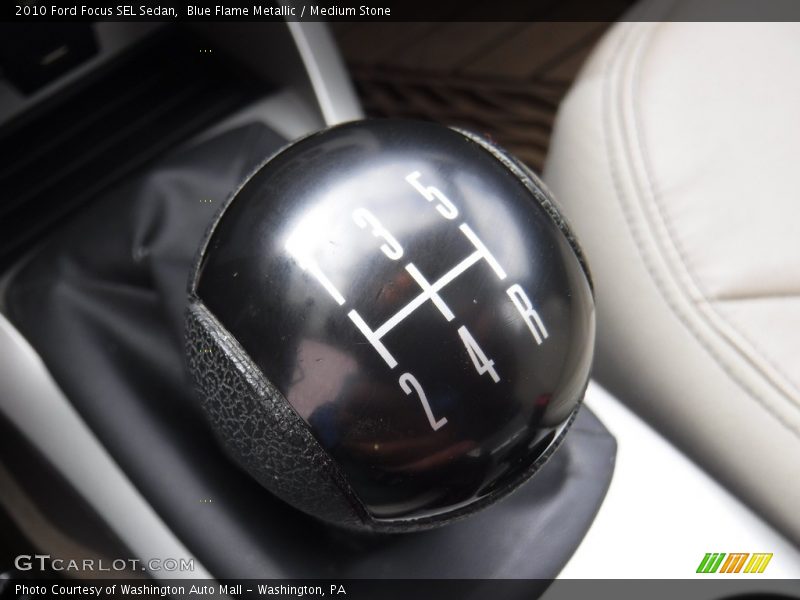 Blue Flame Metallic / Medium Stone 2010 Ford Focus SEL Sedan