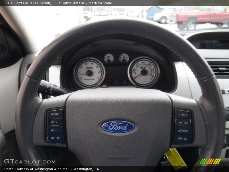 Blue Flame Metallic / Medium Stone 2010 Ford Focus SEL Sedan