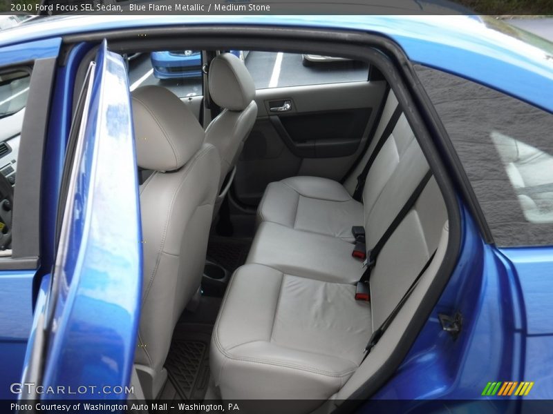 Blue Flame Metallic / Medium Stone 2010 Ford Focus SEL Sedan