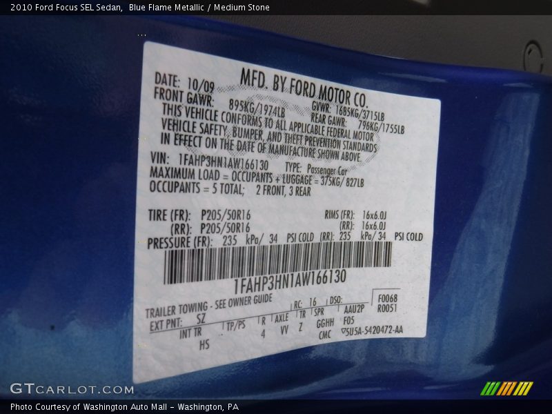 Blue Flame Metallic / Medium Stone 2010 Ford Focus SEL Sedan