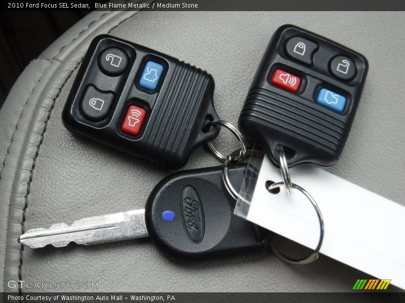 Blue Flame Metallic / Medium Stone 2010 Ford Focus SEL Sedan
