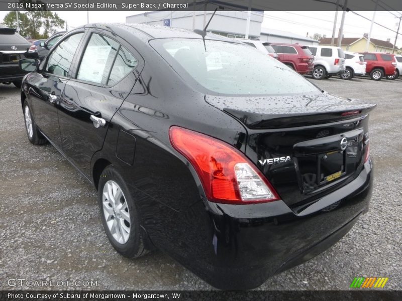 Super Black / Charcoal 2019 Nissan Versa SV Special Edition