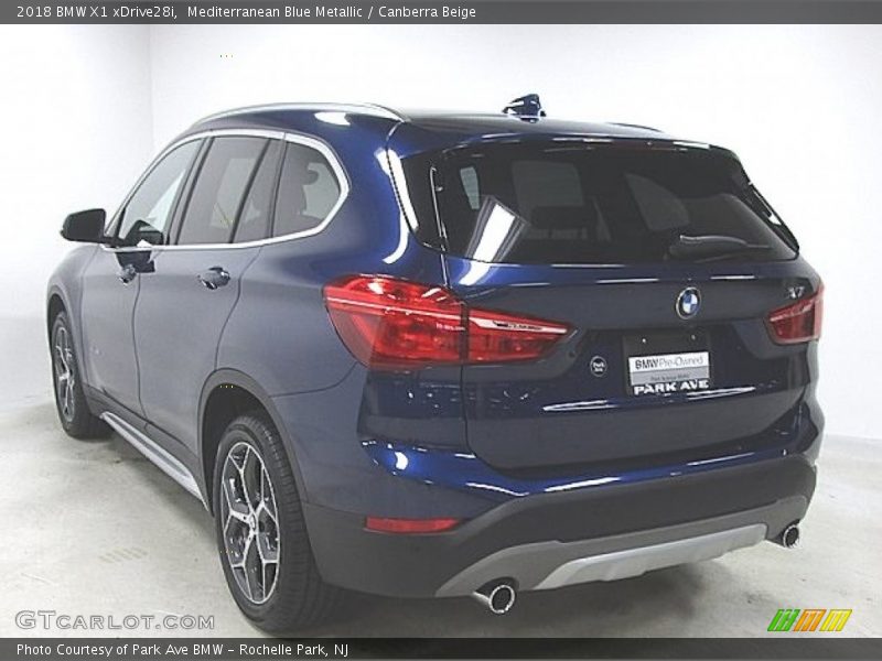 Mediterranean Blue Metallic / Canberra Beige 2018 BMW X1 xDrive28i