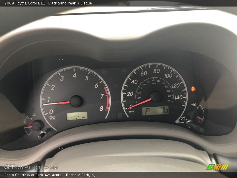 Black Sand Pearl / Bisque 2009 Toyota Corolla LE