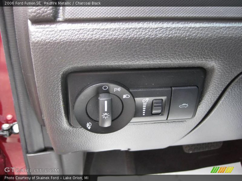 Redfire Metallic / Charcoal Black 2006 Ford Fusion SE