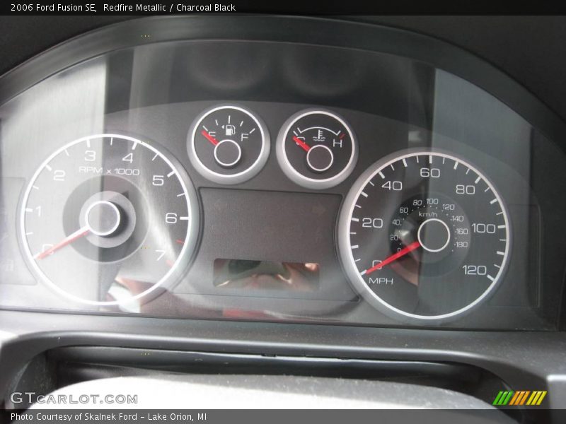 Redfire Metallic / Charcoal Black 2006 Ford Fusion SE
