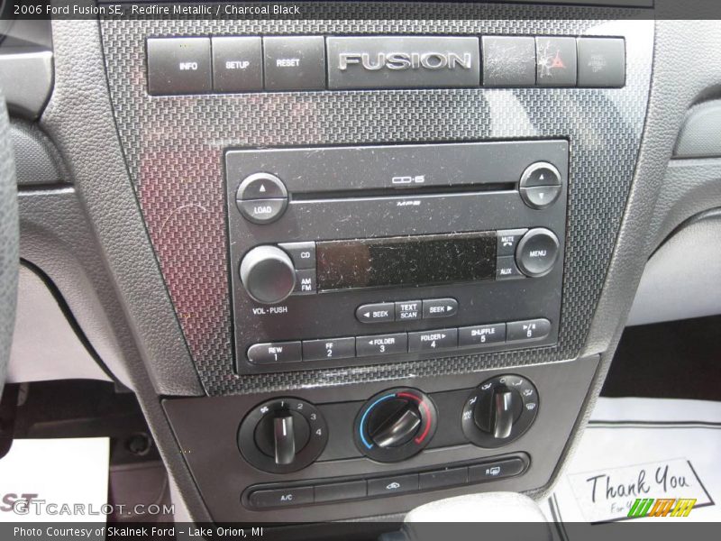 Redfire Metallic / Charcoal Black 2006 Ford Fusion SE