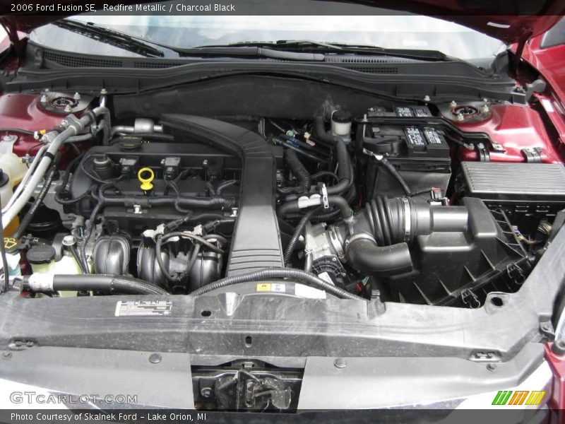 Redfire Metallic / Charcoal Black 2006 Ford Fusion SE